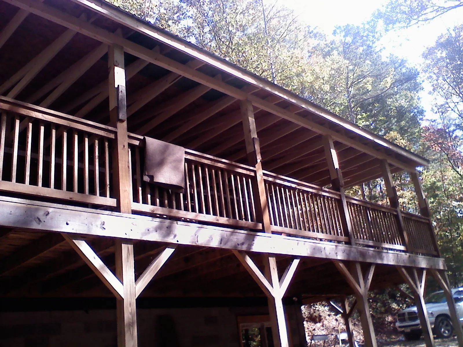 Timber framing under a new elevated porch and deck — Roof Leak Repair in Forks by Roofing Brothers